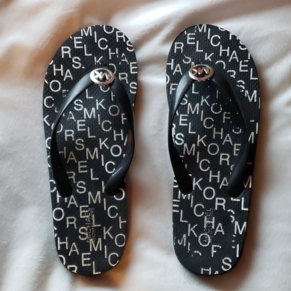 Michael Kors Shoes - Michael Kors Black/White Flip Flops Size 9